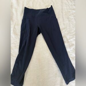 Athleta Women's salutation stash capri leggings in Navy small petite